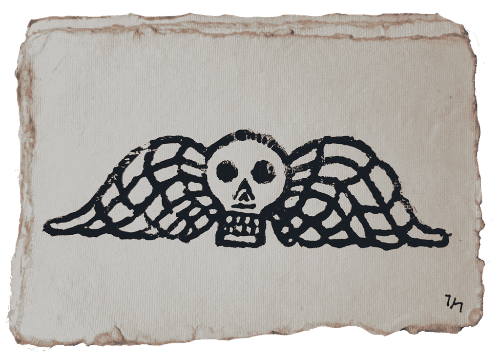 winged skull linocut print
